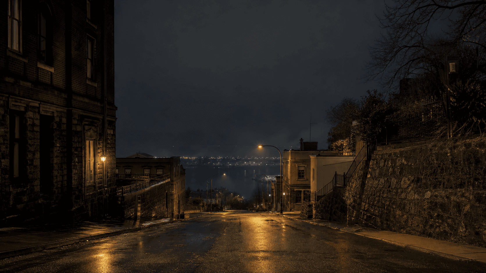 Dark road outside New Westminster at night, lit by headlights